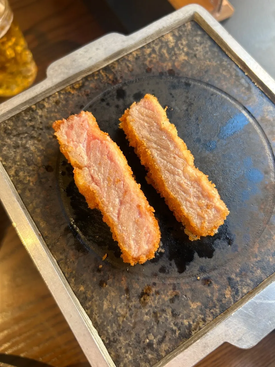 Sirloin gyukatsu being grilled on the mini brazier
