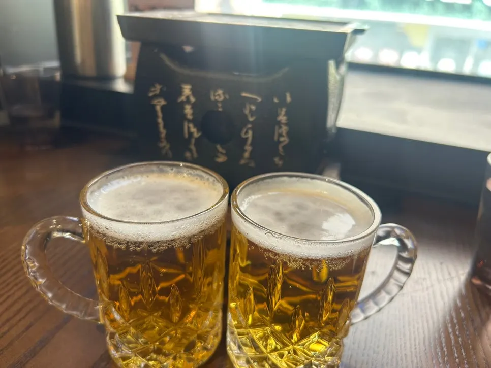 Gyukatsu spread served with a glass of draft beer