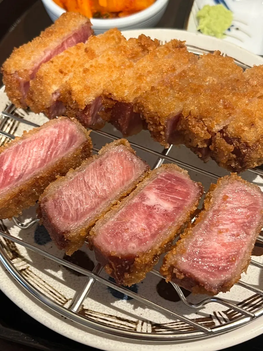 Cross-section of tenderloin gyukatsu showing vivid marbling