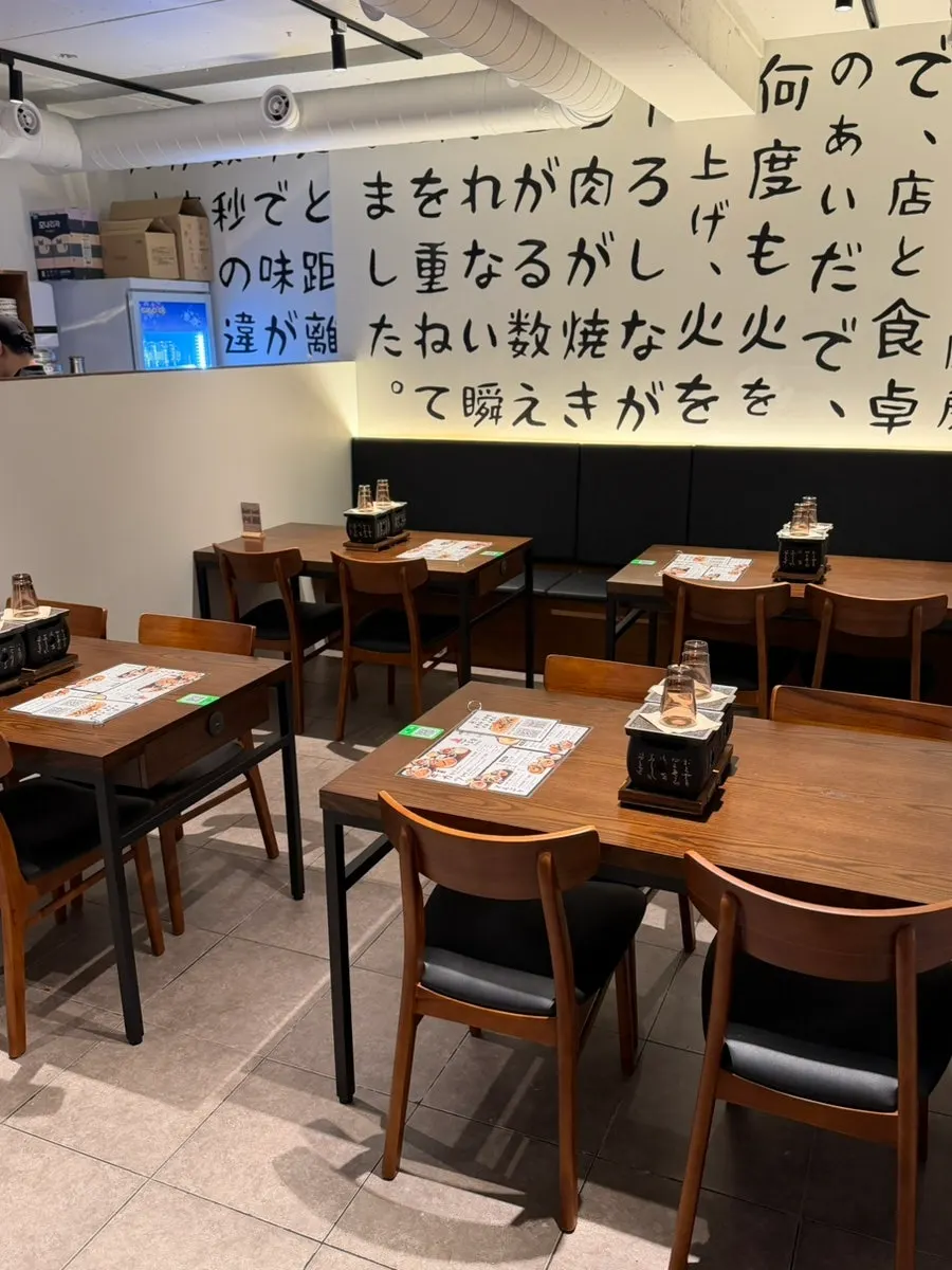 Second-floor dining room with open ceiling