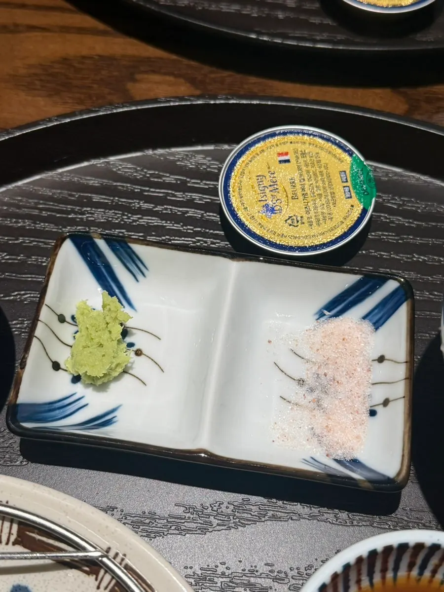 Plate of wasabi and salt for dipping
