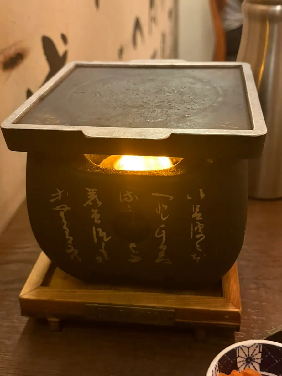 Lit personal brazier with gyukatsu