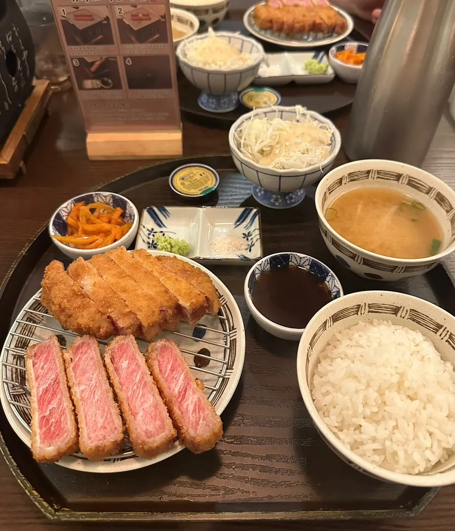 Table setting with cabbage salad and soup
