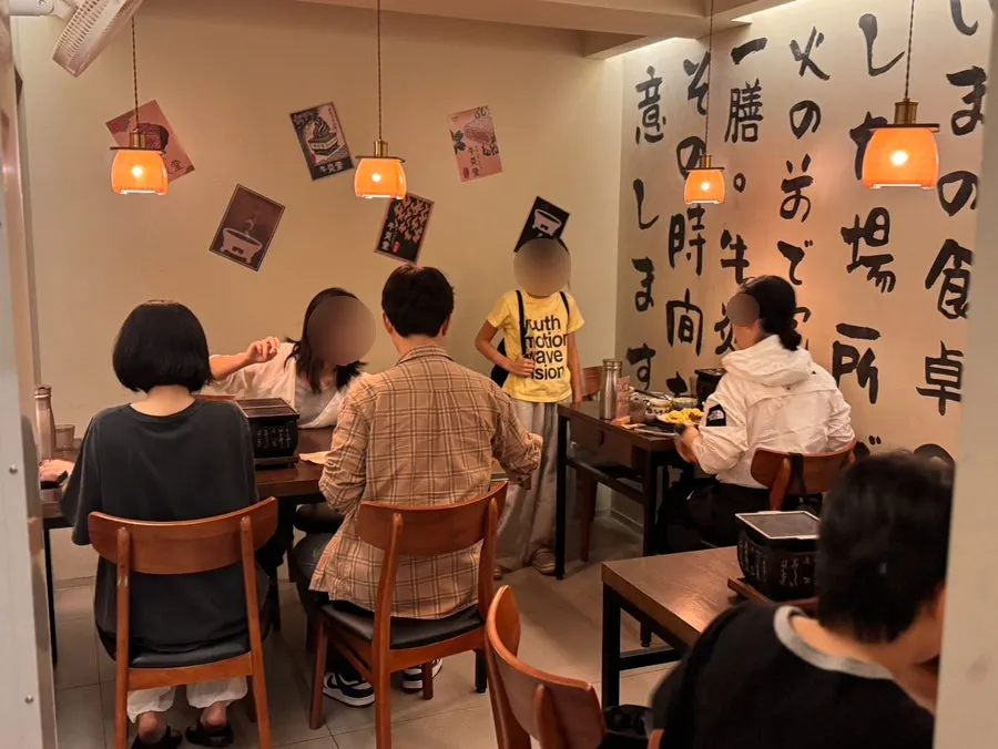 Seating with 2-top tables and a counter-style table