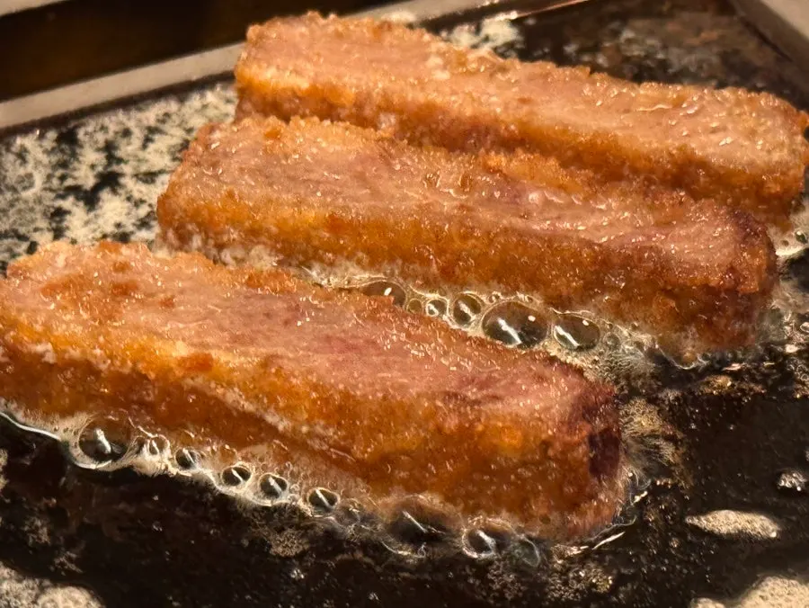 Crispy outside, juicy inside of the striploin beef katsu