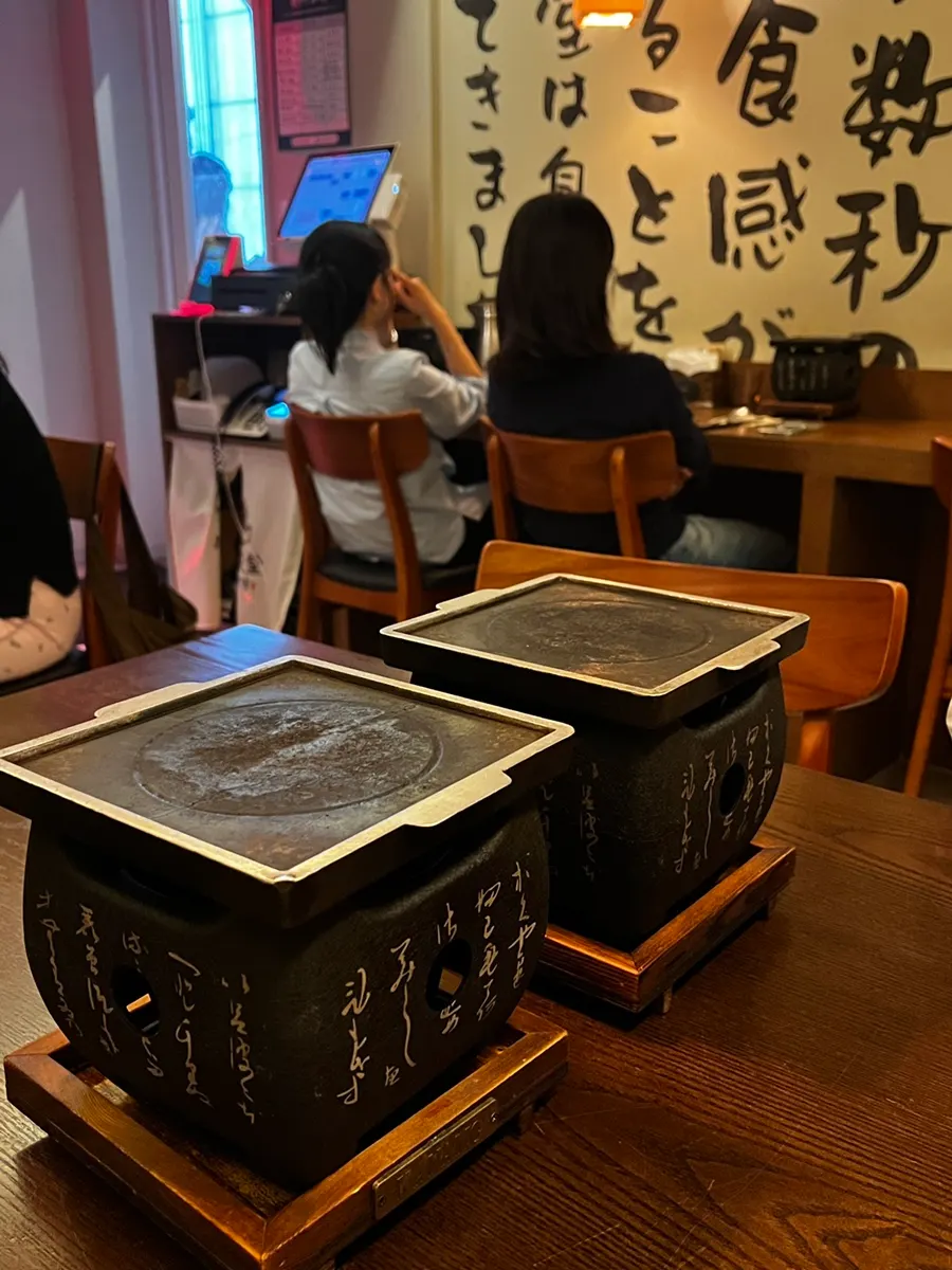 Individual mini grill set on each table