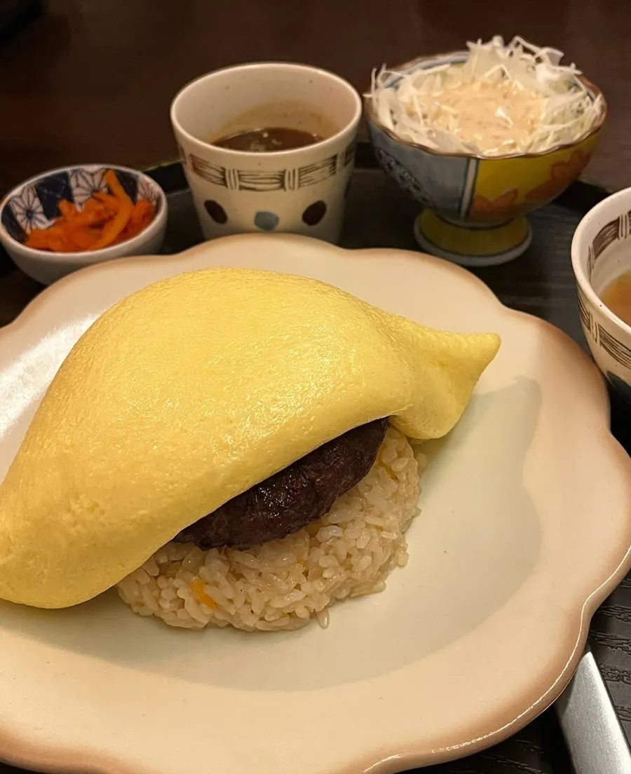 Hamburg omelet rice covered in an egg blanket