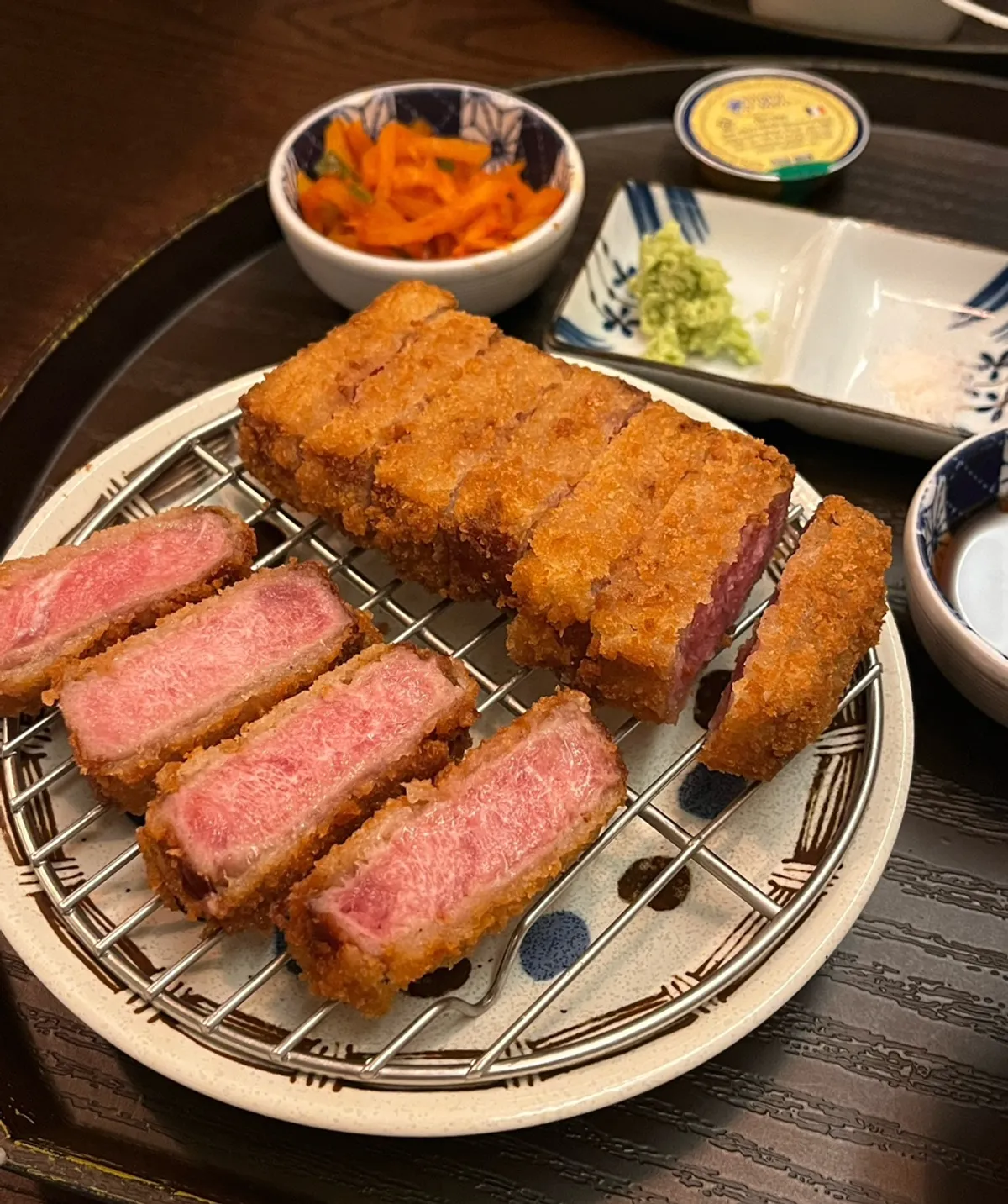 Thickly sliced tenderloin gyukatsu served on the plate
