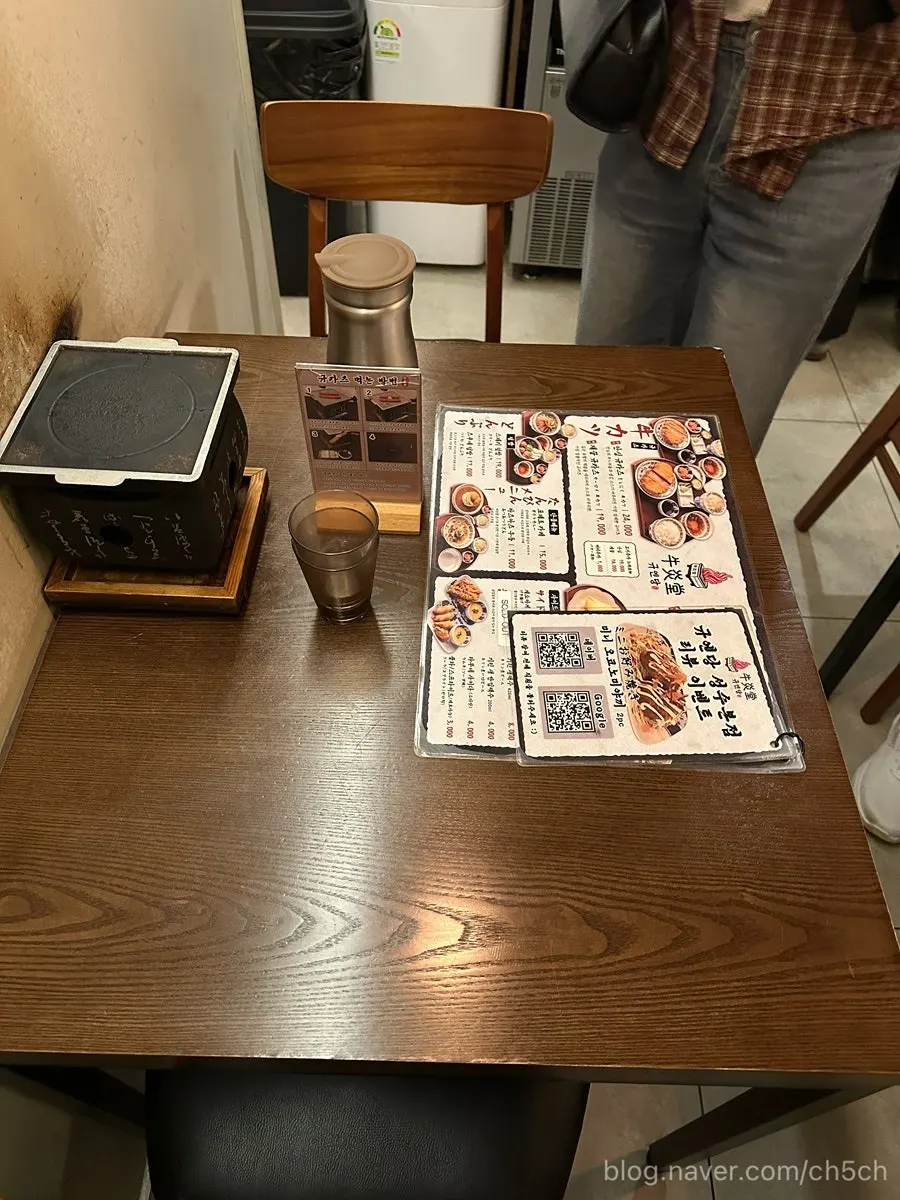 Table right in front of the kitchen with air conditioning