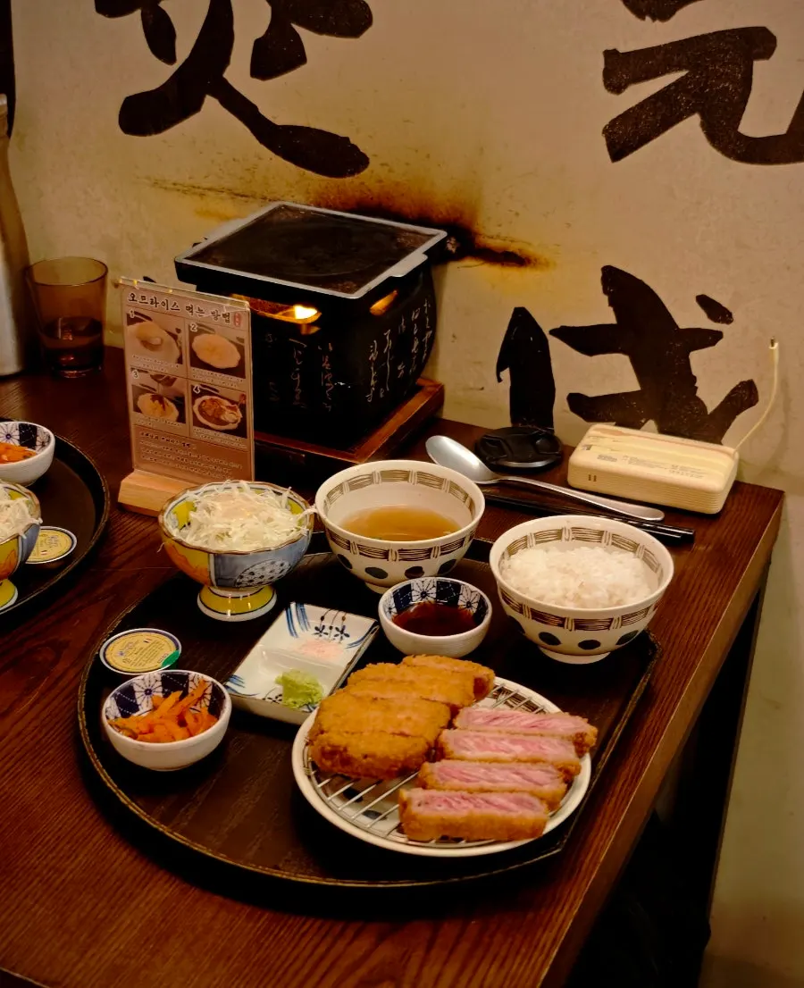 Gyukatsu grilling on a small tabletop stove