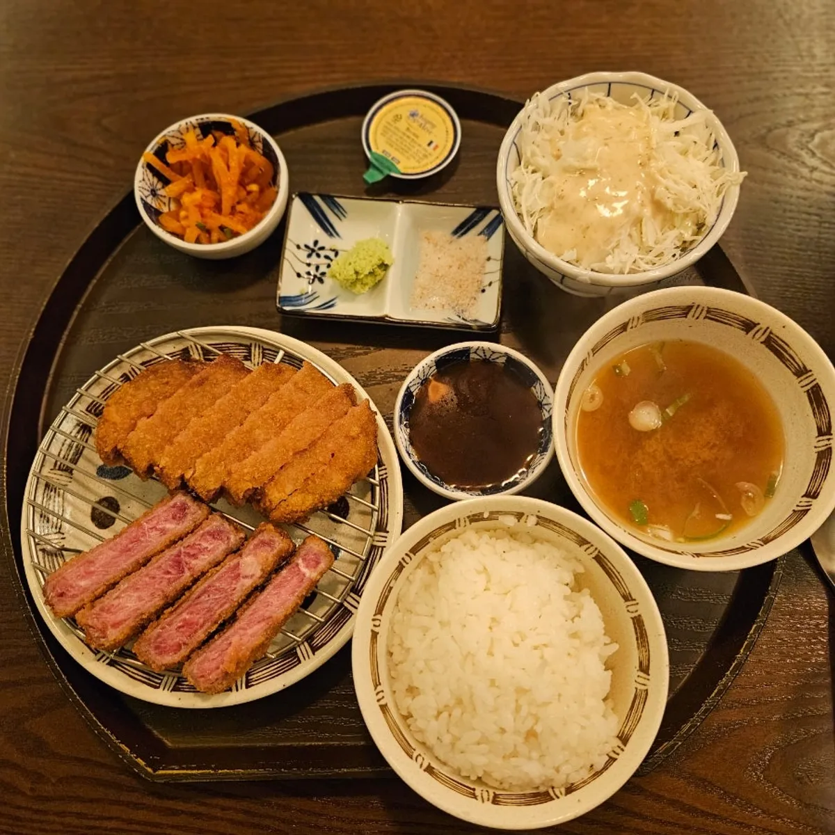 Cross-section of striploin gyukatsu grilled on the tabletop stove
