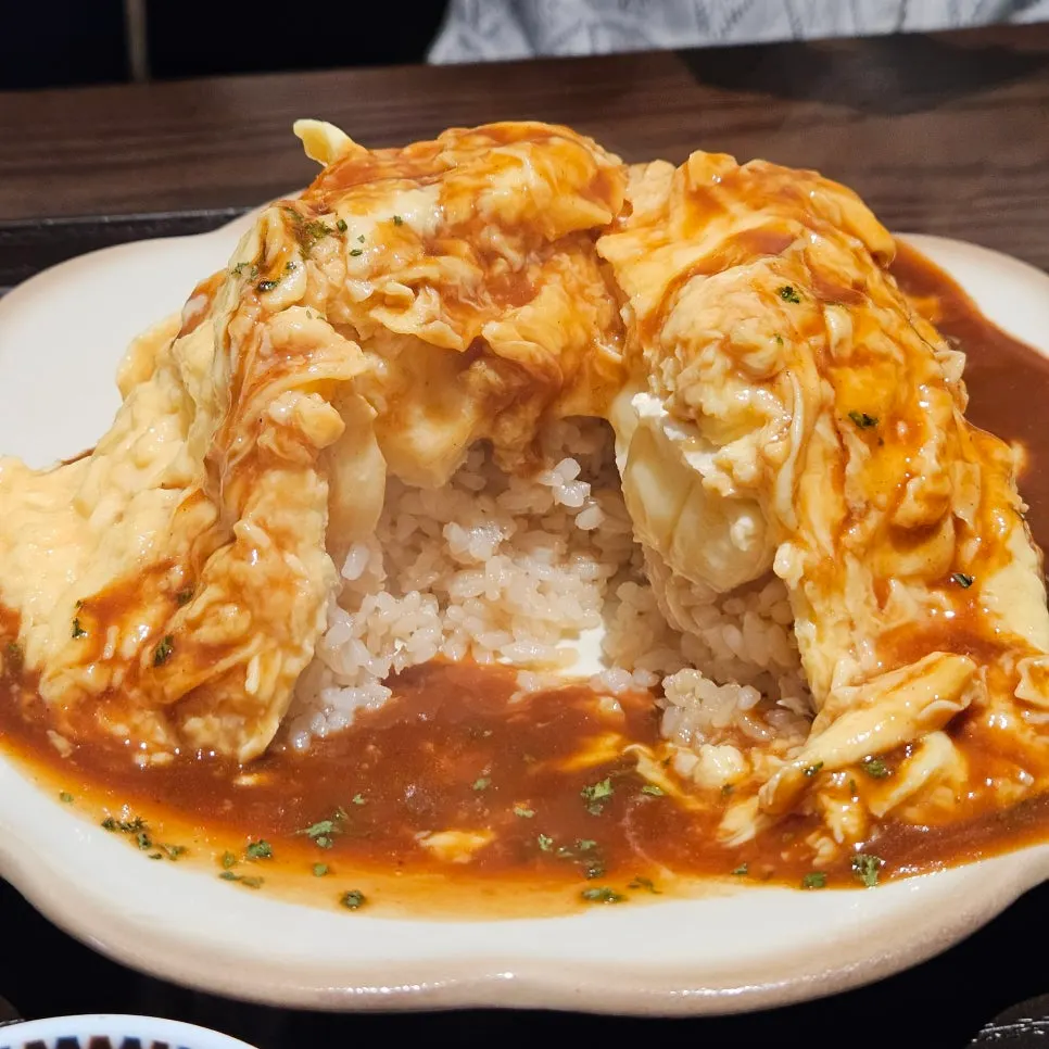 Close-up of the egg blanket blended with sauce