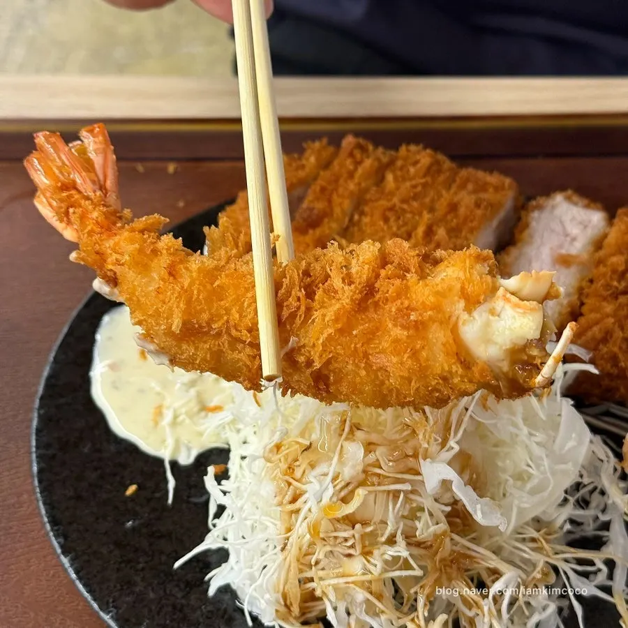 Cross-section of the shrimp cutlet showing plump shrimp meat