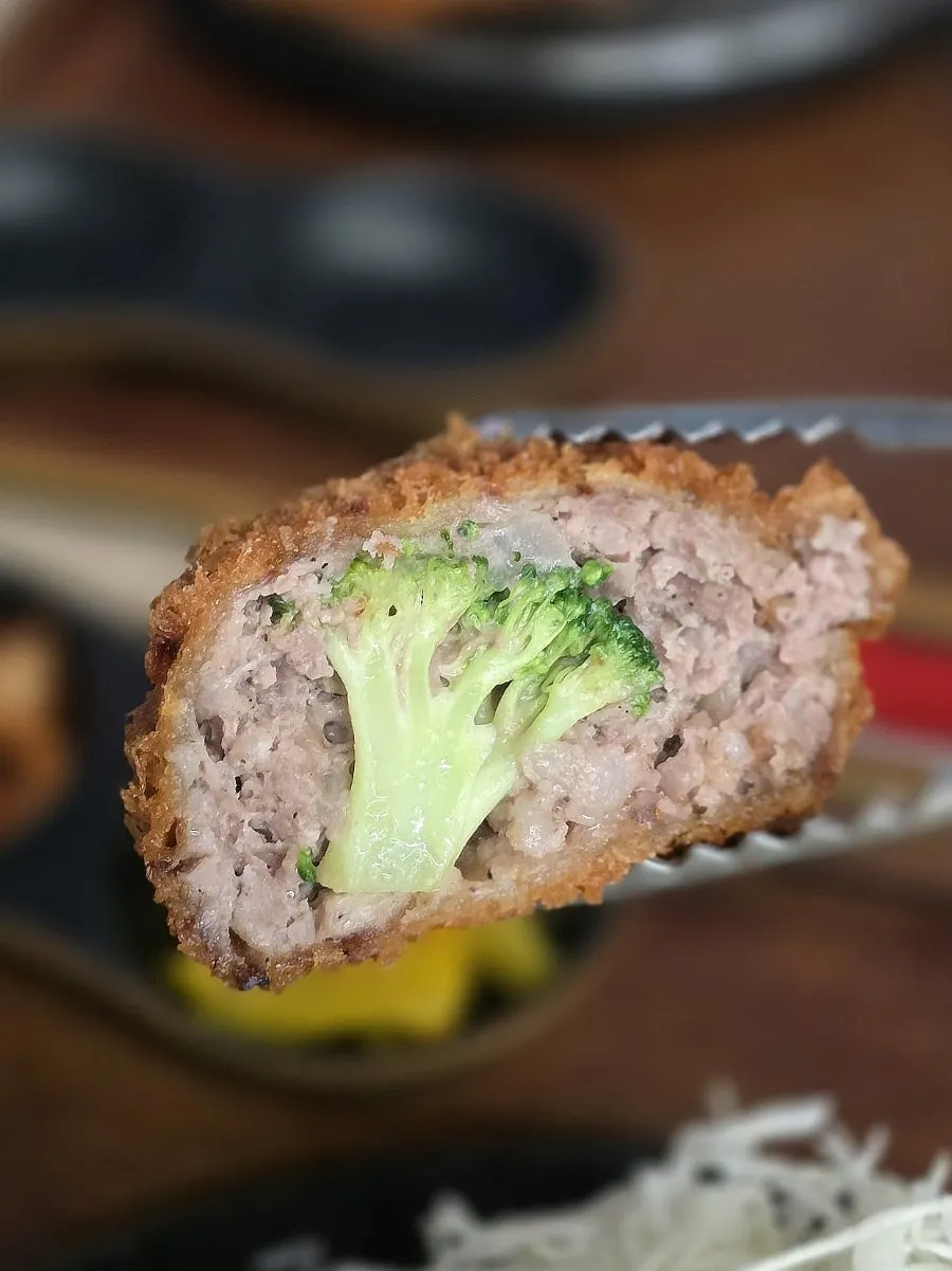 Thick, golden-fried menchi katsu