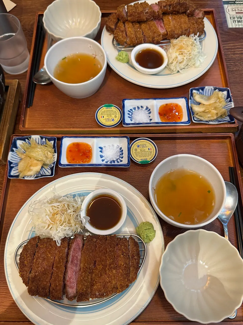 Gyukatsu set spread with rice, soup, and side dishes