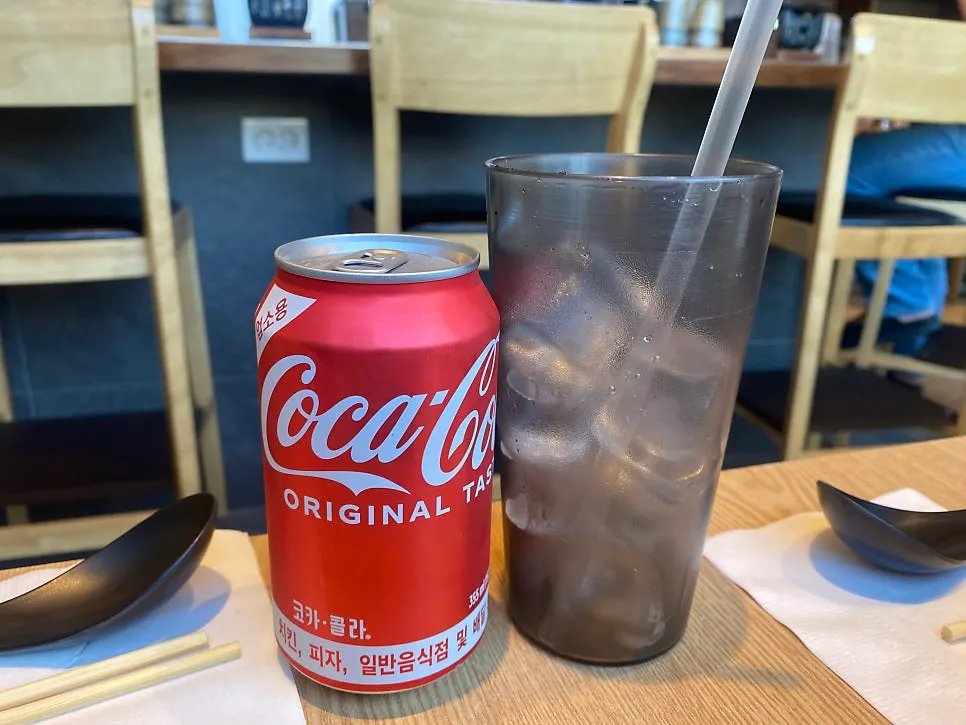 A glass of cola served alongside the meal
