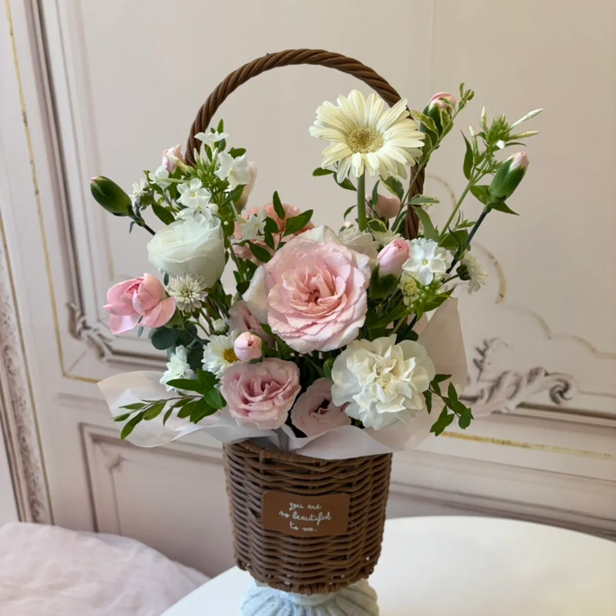 Mini flower basket made in pink tones