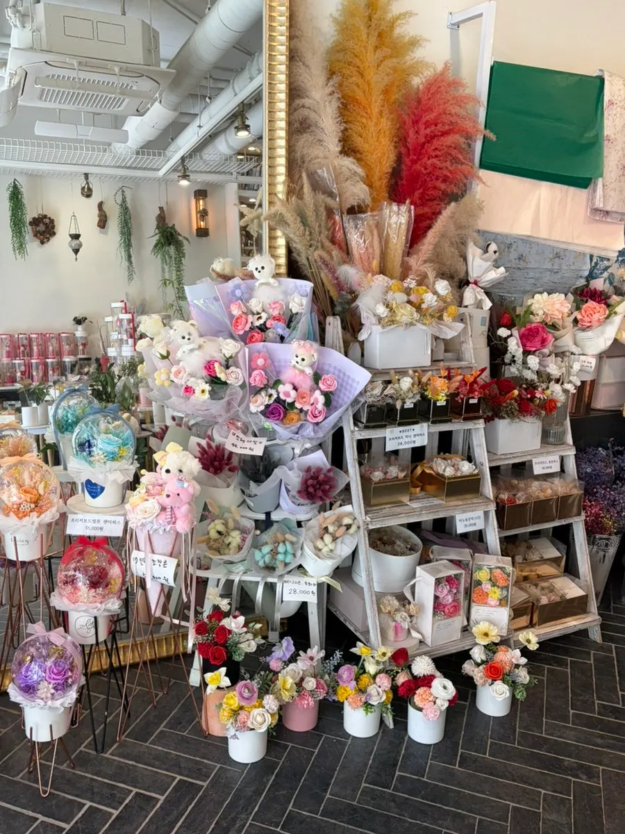 Fresh-cut bouquets displayed inside the shop