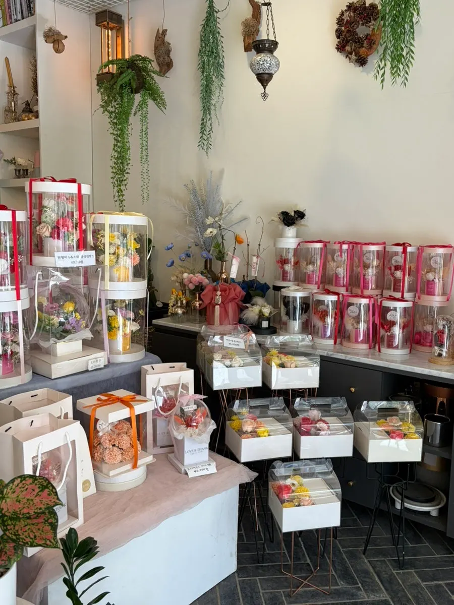 Display area filled with bold, vivid-colored flowers