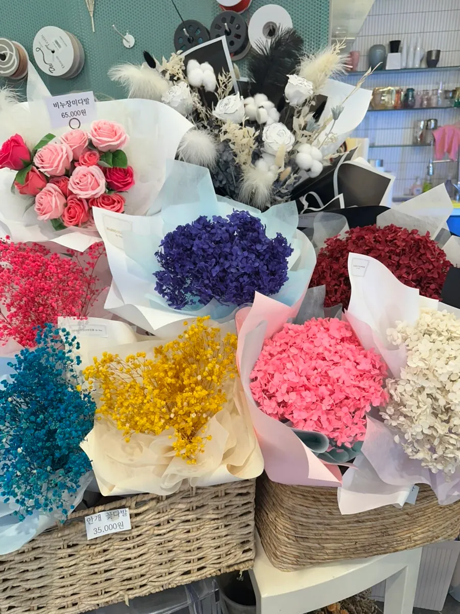 Display of preserved rose and soap rose bouquets