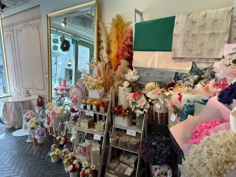 Corner display of preserved flowers and centerpieces