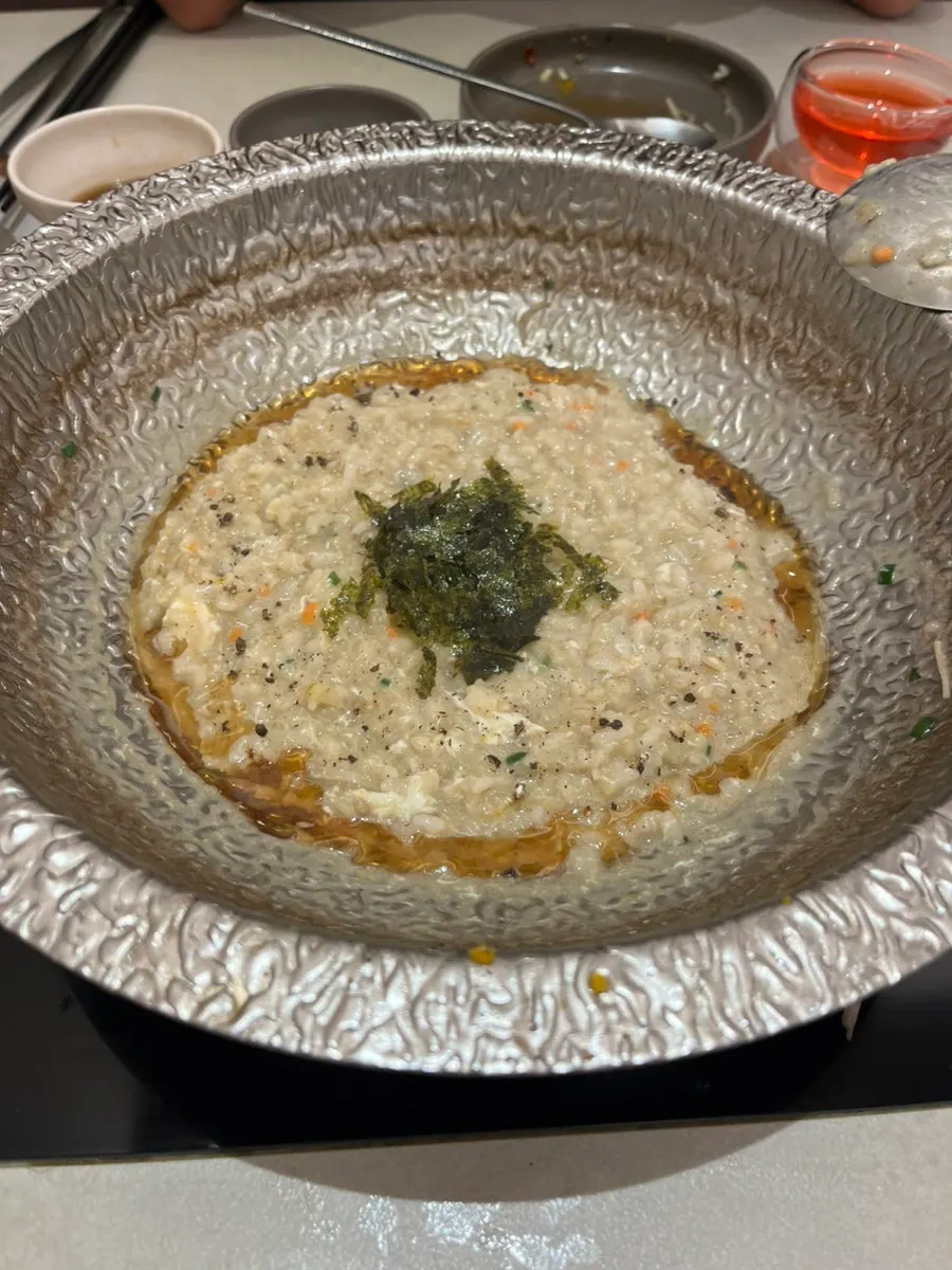 참기름과 김가루를 올린 계란죽 완성