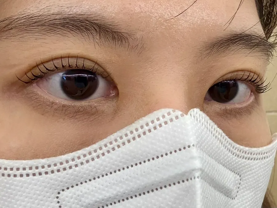 Close-up of naturally curled lashes