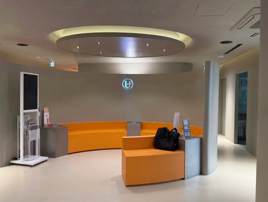 Spacious waiting area sofa and lighting