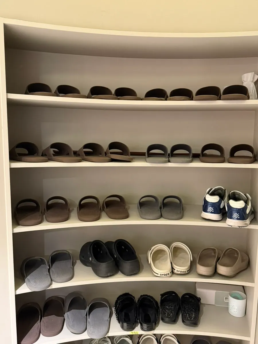 Indoor slippers set out beside the entrance
