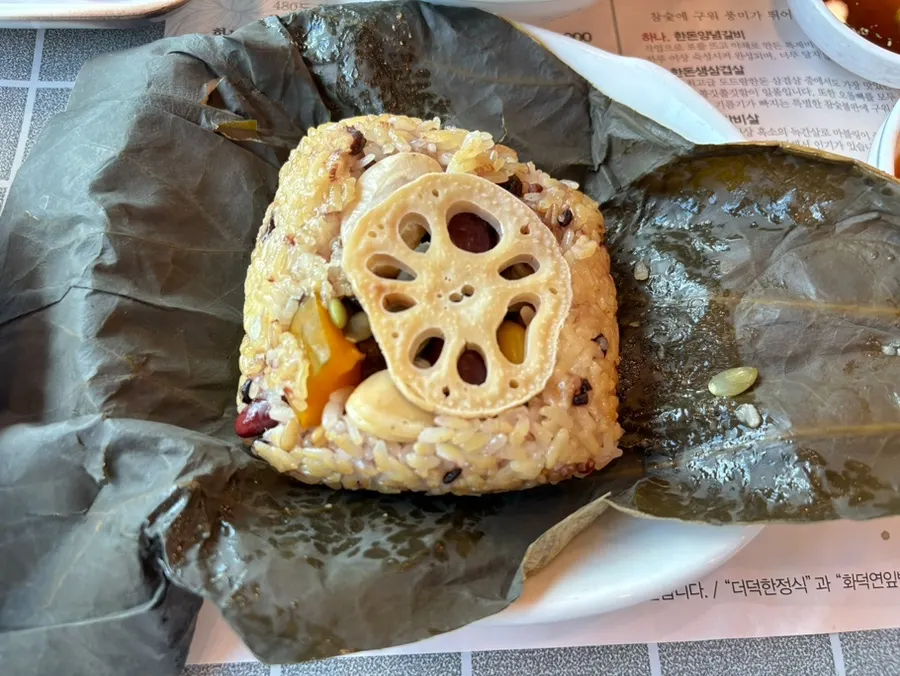 Lotus-leaf rice cooked in the wood-fired oven