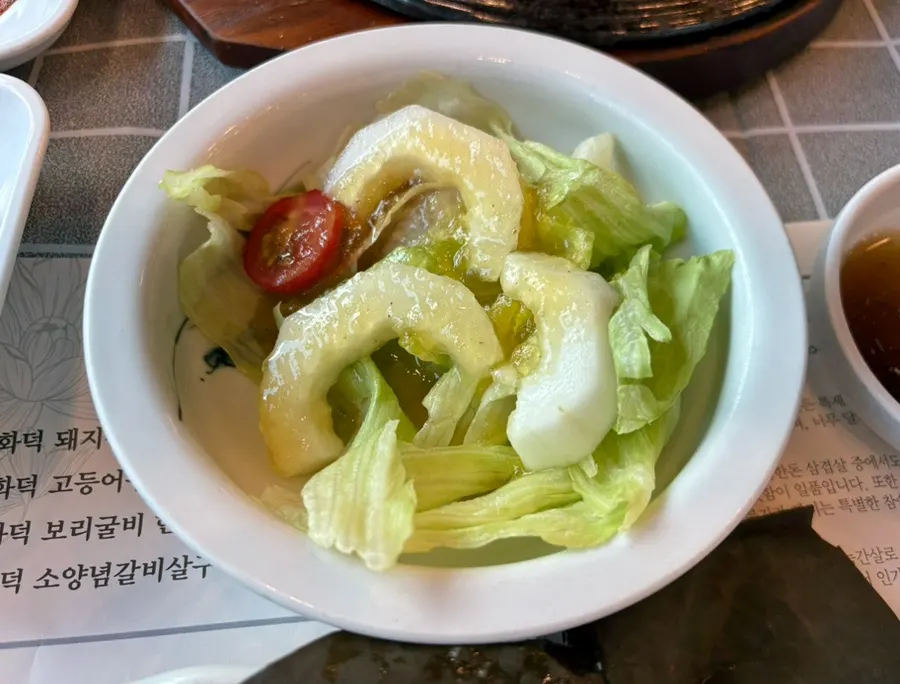 Melon salad and various seasoned side dishes