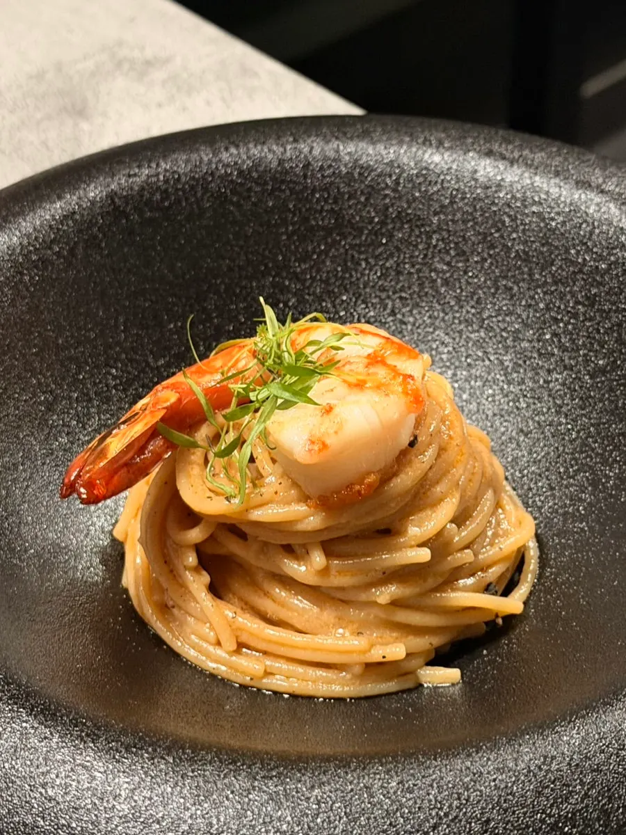 Bisque pasta with sauce clinging to the noodles