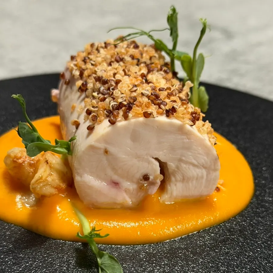 Chicken breast sous vide topped with quinoa