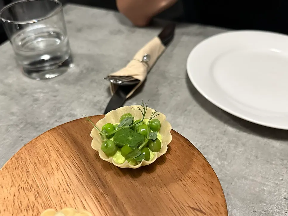 Close-up of bite-sized tart plating