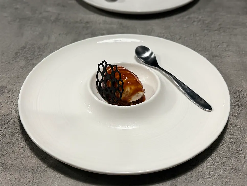 Earl Grey ice cream served on a chilled plate
