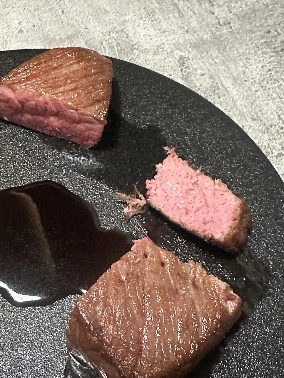 Chuck flap plate with carrot and roasted garlic garnish