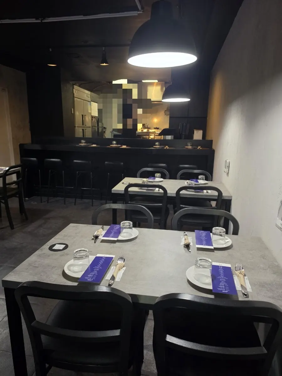 Hado's dining hall bathed in soft lighting