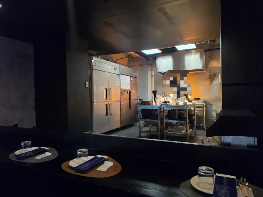 Seating with a view of Hado's open kitchen