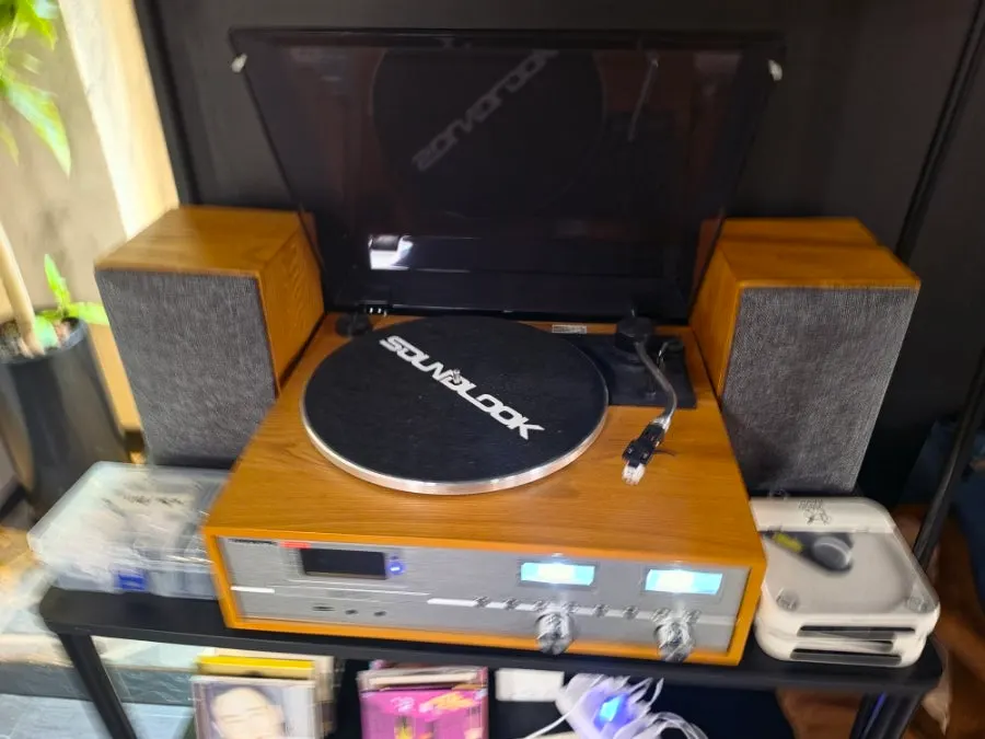 Turntable and CD collection in a corner of Hado