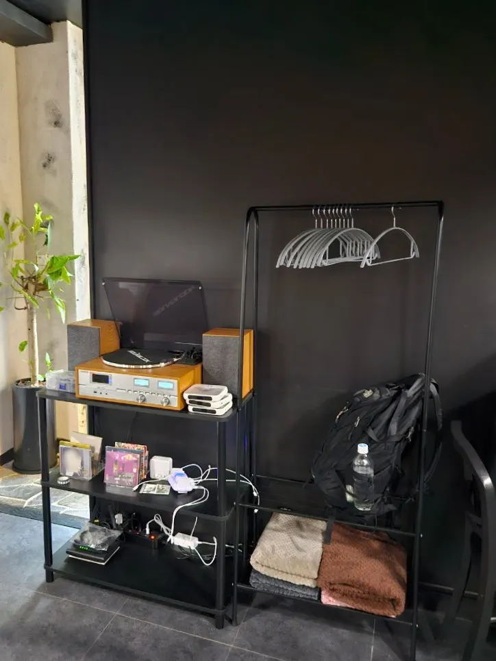 Storage area for bags and coats at the side of the restaurant