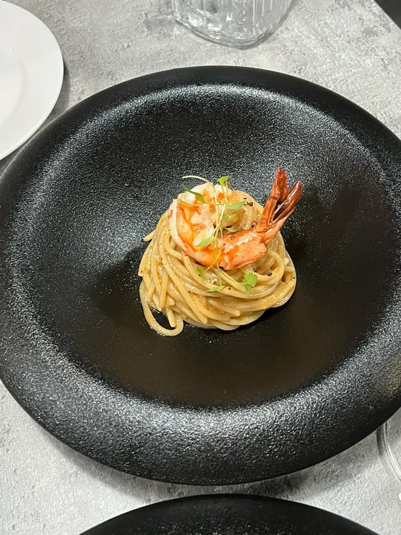 Plating of Hado's bisque pasta