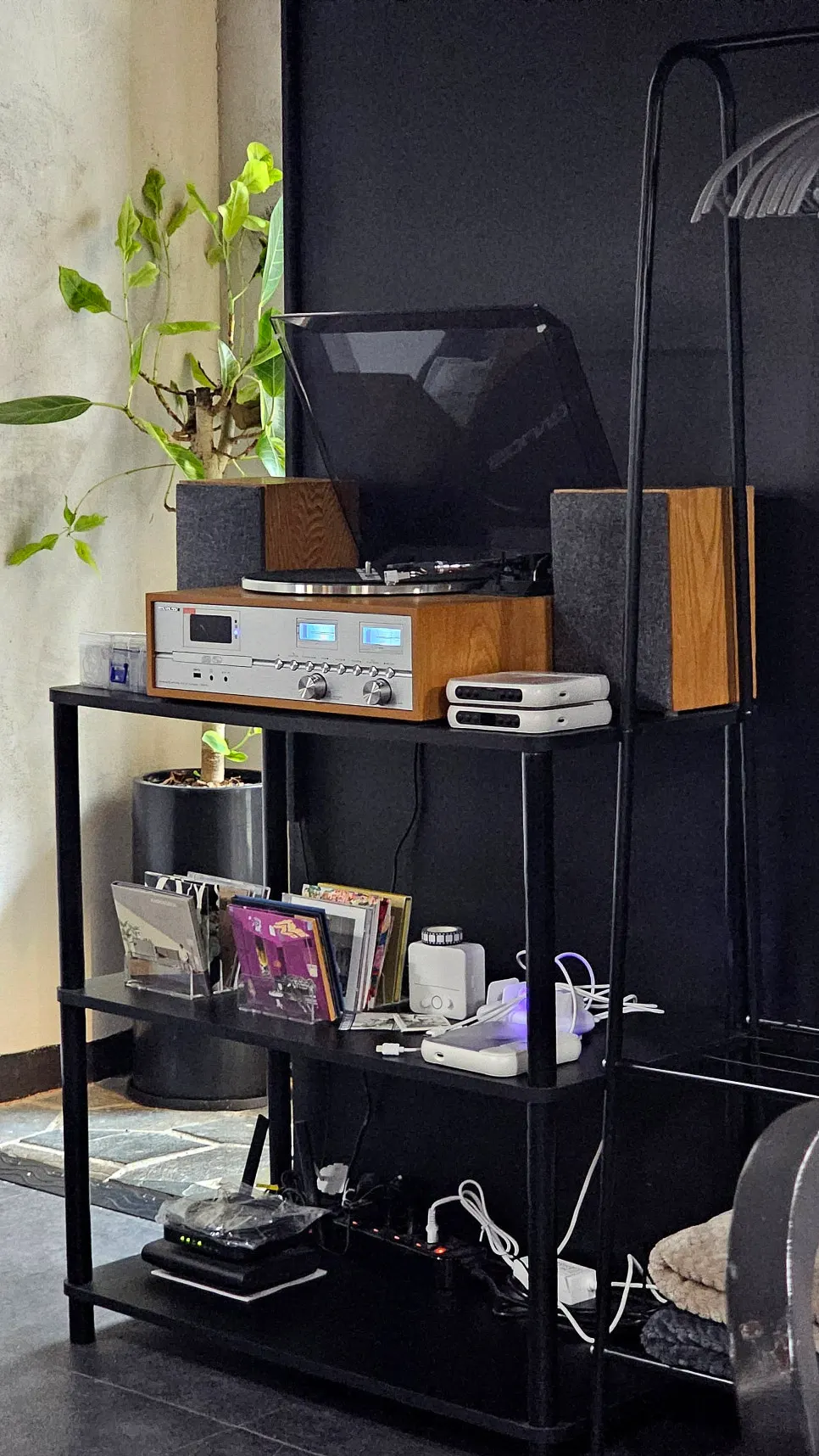 CD player and earphones set up at Hado