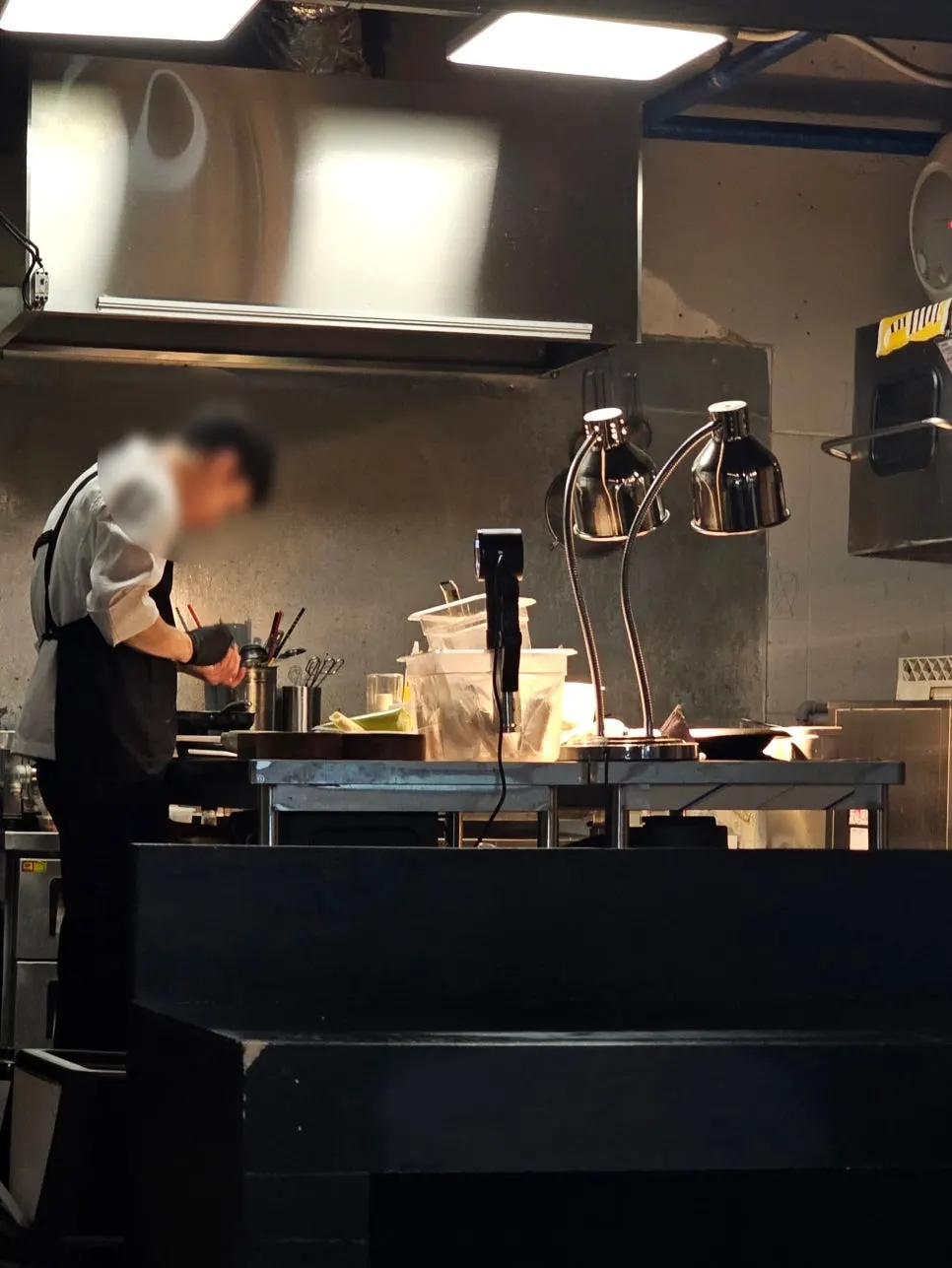 View of Hado's open kitchen and bar seats