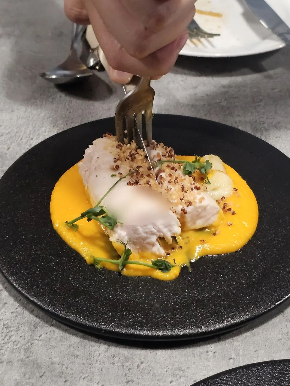 Sous vide steak served with carrot-based purée