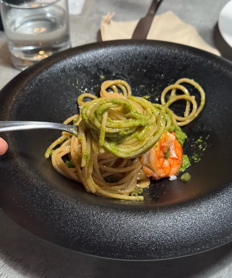 Yuzu bisque pasta topped with minari pesto