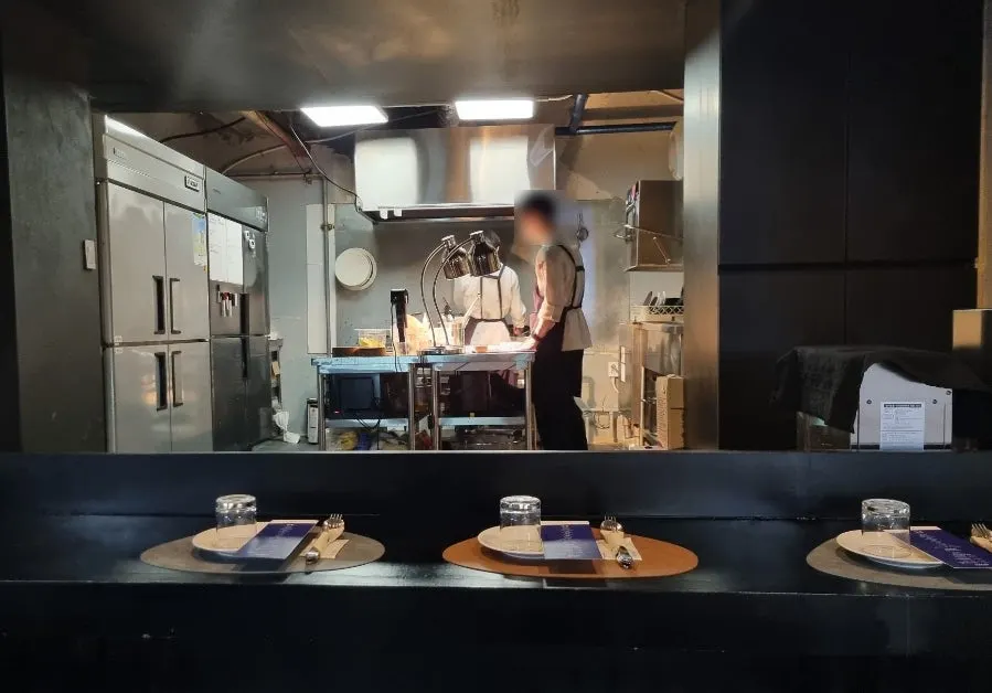 View of the interior atmosphere from a table at Hado
