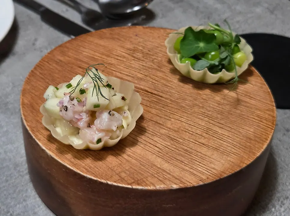Two bite-sized starter tarts at Hado