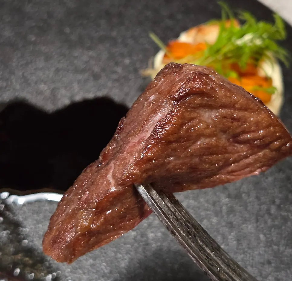 The steak plate nearly emptied