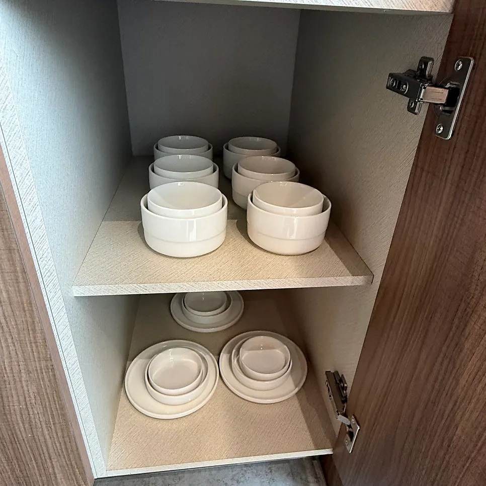 Kitchen with room cooking equipment