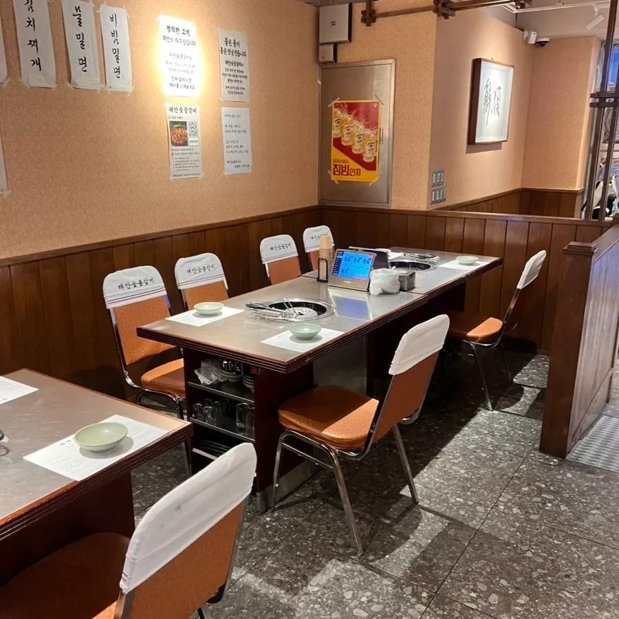 Interior of Haean Sutbul Galbi with retro tables and chairs